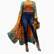 copper gold and green kimono paired with copper bustier and dark blue jeans