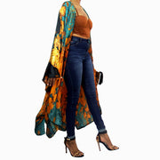 long breezy kimono cardigan worn over jean and a t-shirt as a statement piece jacket