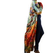 long kimono robe in red and green summer print blowing in the wind 