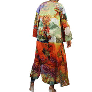 Floor length kimono worn by woam in jeans and a white t-shirt shown from the back