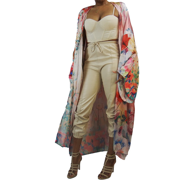 flowers grom from the bottom of flowing long kimono duster robe worn as a statement jacket over clothing