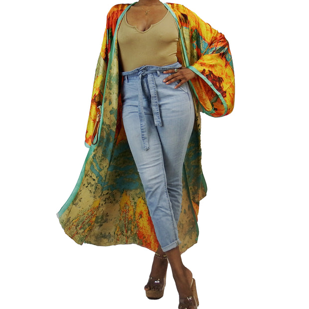 flowing floor length kimono cardigan in teal and orange layered over clothing