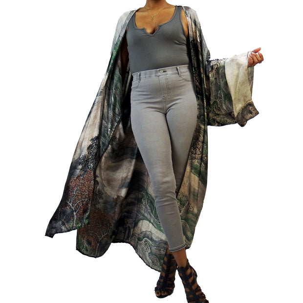 Grey floor length kimono cardigan worn over grey jeans and t-shirt