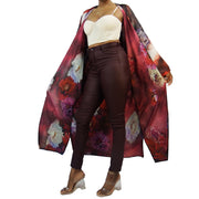 red satin kimono with unicorns dancing across the front and flowered inner lining