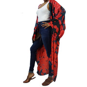 red an blue flower peatls decorate this floor length fashion kimono worn with jeans and a white tee