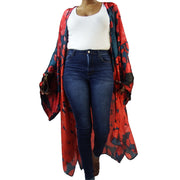 flower petal printed kimono robe worn over outfit of white t-shirt and dark blue jeans